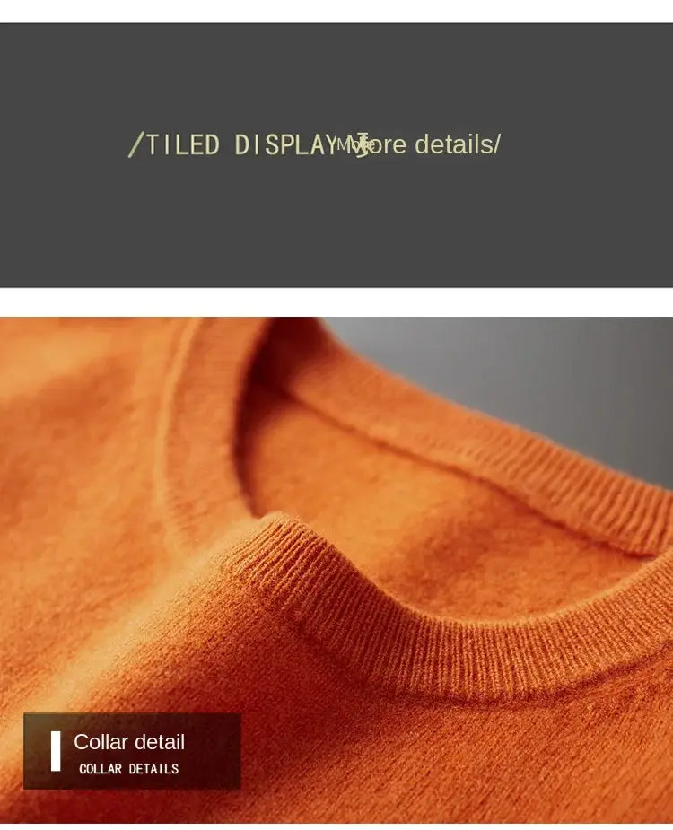 Orange knit sweater close-up showing ribbed collar detail on a soft, bulky pullover.