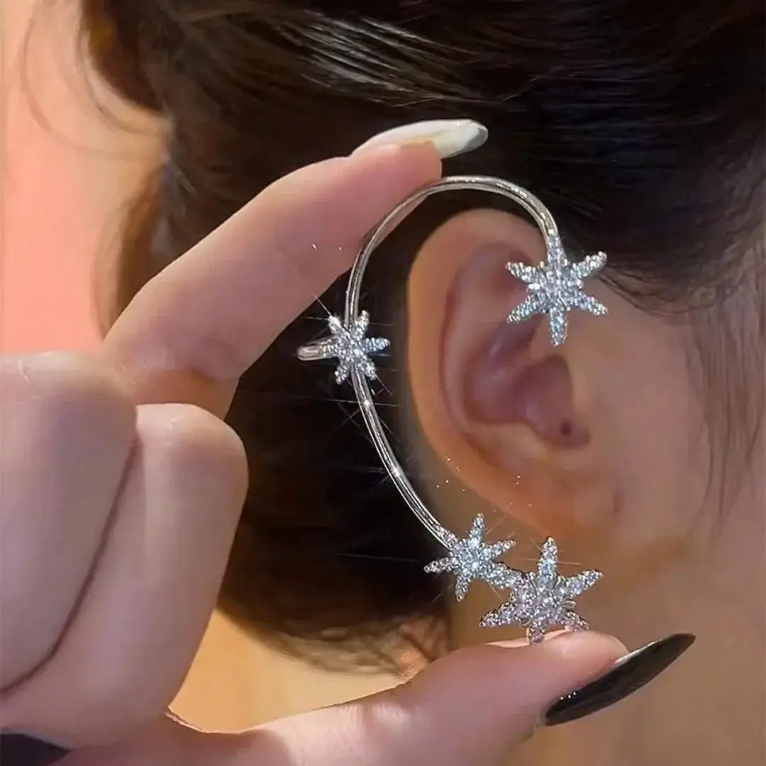 Silver-plated leaf butterfly clip earrings on a curved ear cuff with zircon stones