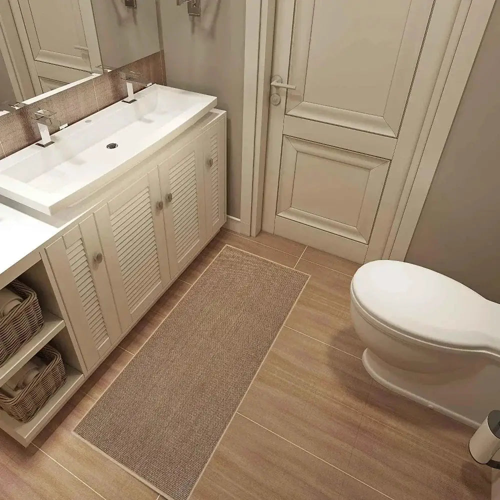 Simples Market washable non-slip faux sisal kitchen runner with rubber backing in beige along bathroom vanity
