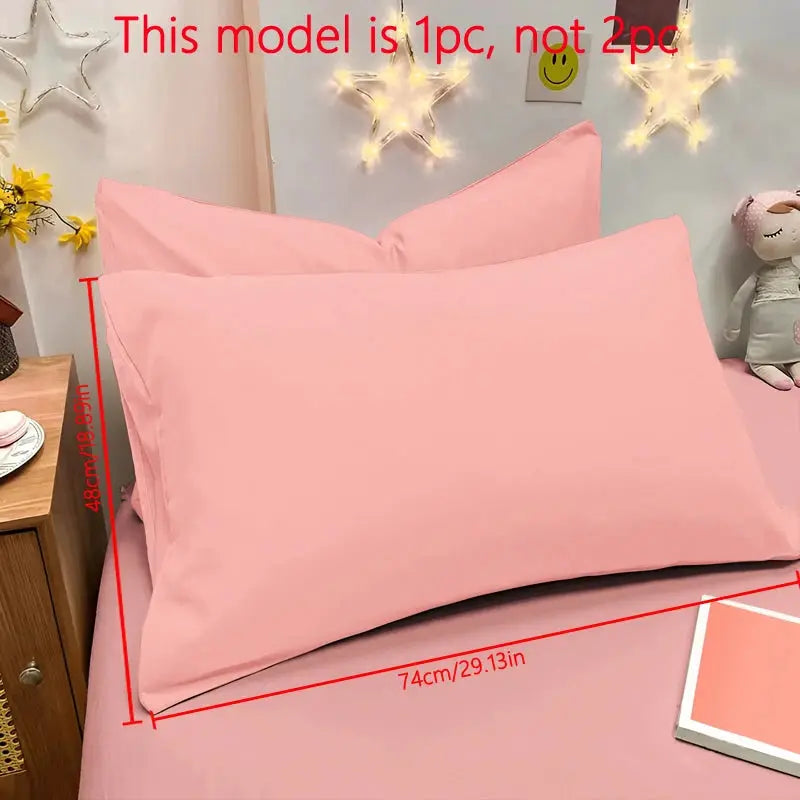 Pillowcase, pink matte solid color, envelope closure, 74x48 cm; two pink pillows shown