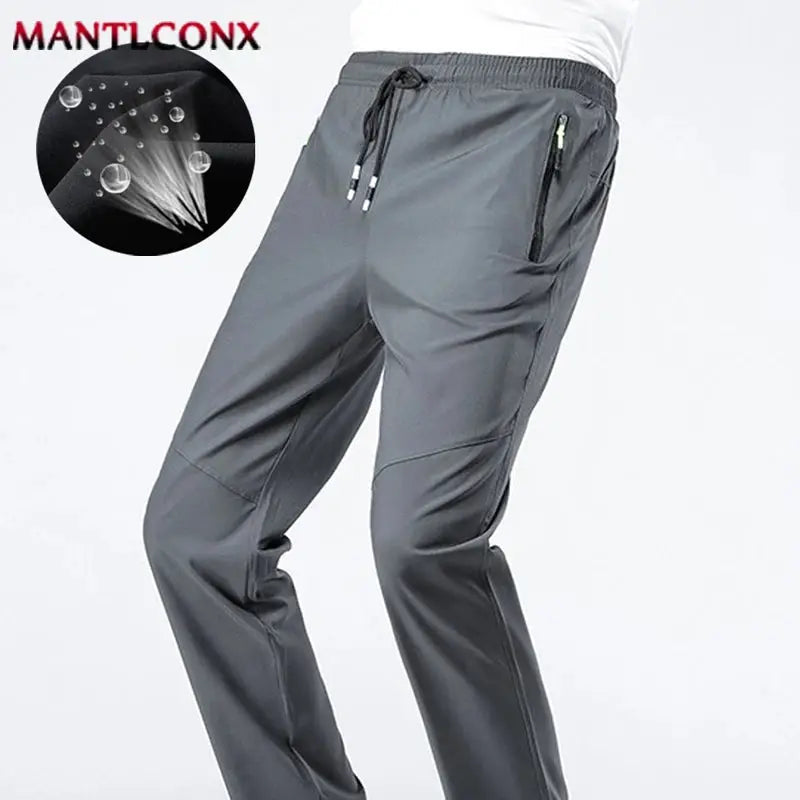 Men's breathable quick-dry jogger pants with elastic waist, zip pockets, gray, MANTLCONX