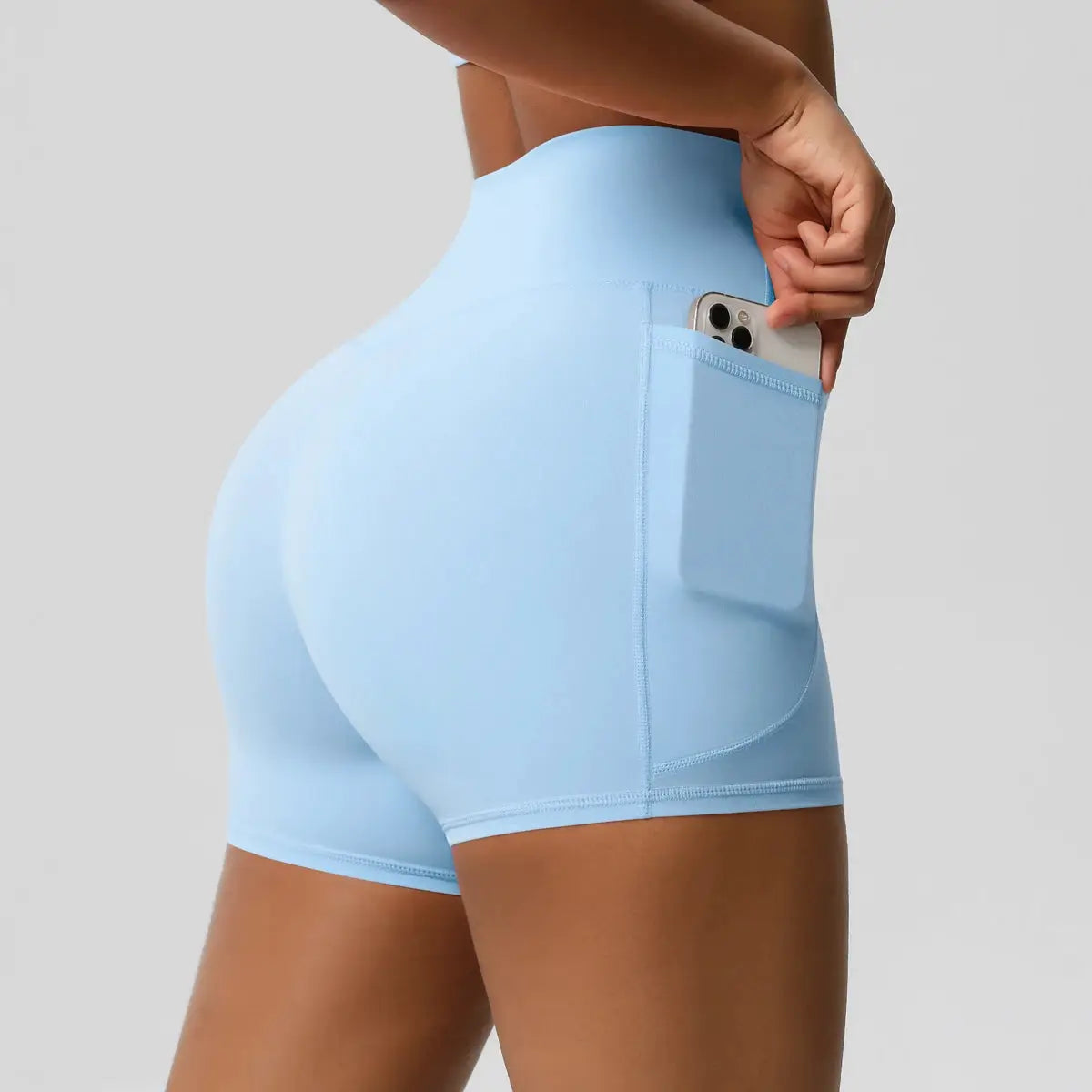 Simples Market women's blue pocketed yoga shorts; high-waist, squat-proof fitness shorts for gym workouts