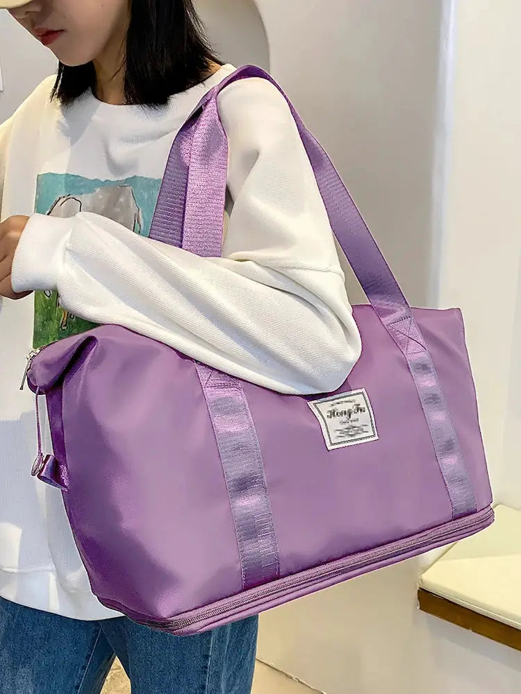 UNIXINU purple nylon carry-on duffle bag by Simples Market with shiny lavender straps, large capacity
