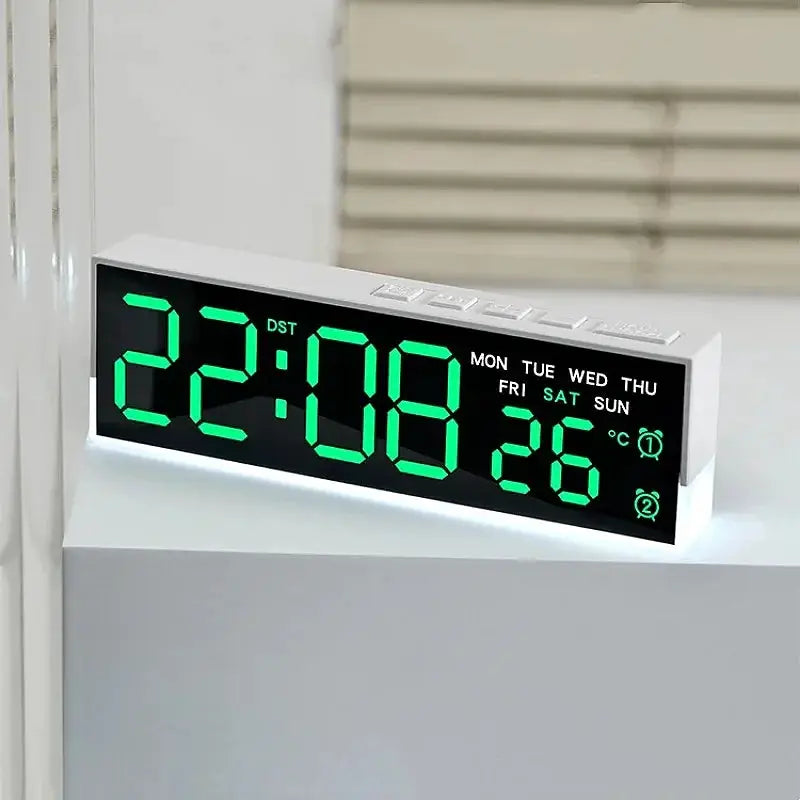 White USB-powered digital alarm clock with large green LED time display, weekday indicators, and temperature readout.