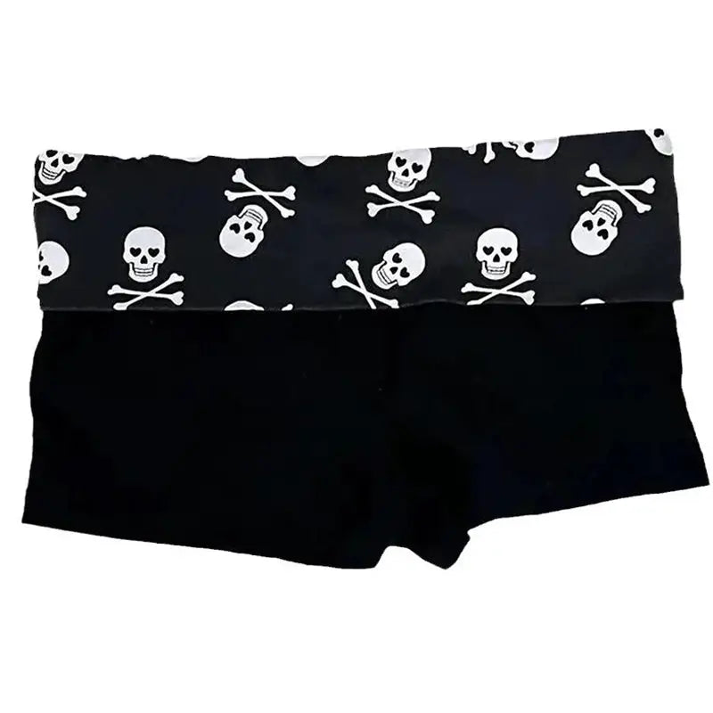 Skull-print color-block shorts for women by Simples Market, black with skull waistband and low-rise style.
