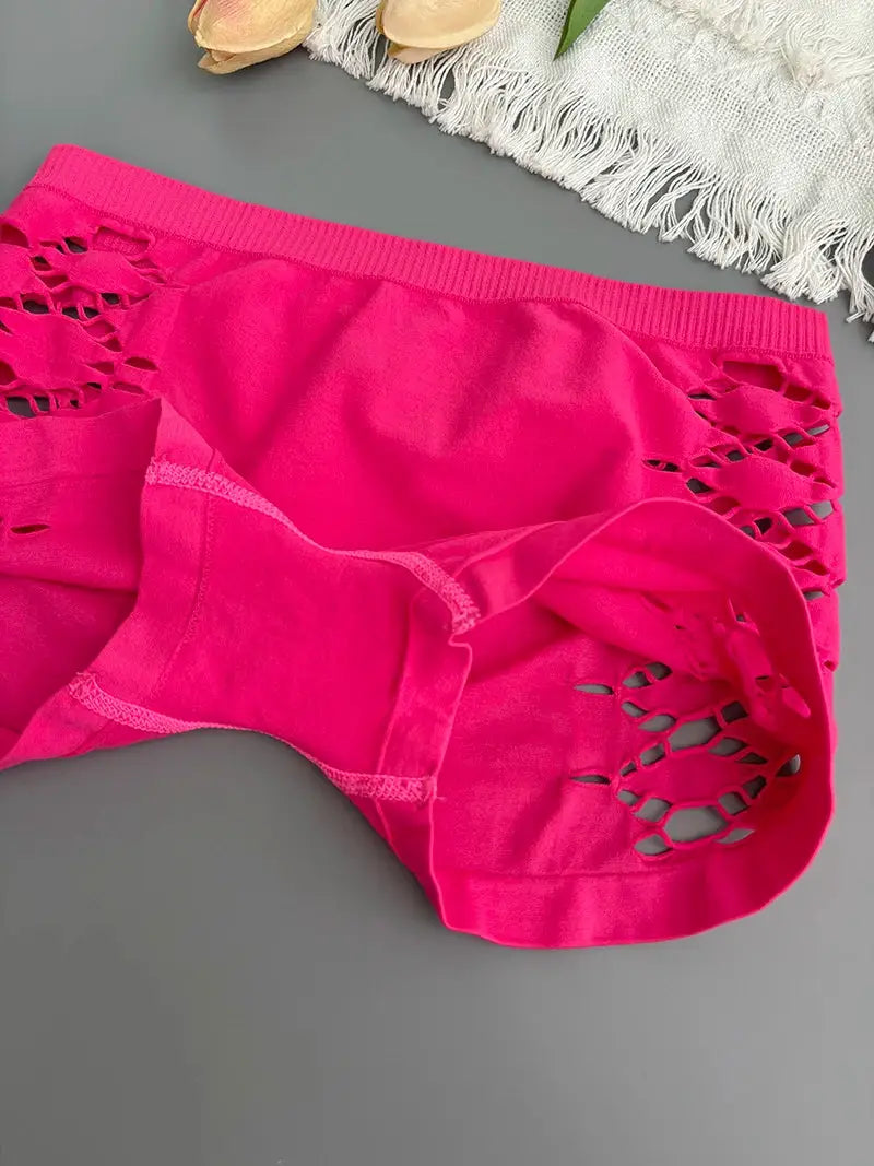 Pink seamless sport underpants with side mesh cutouts, shorts-style panties.