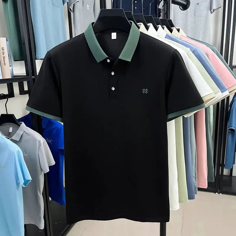 Simples Market polo shirt, black silk-cotton, short sleeves with green collar and cuffs, small green logo