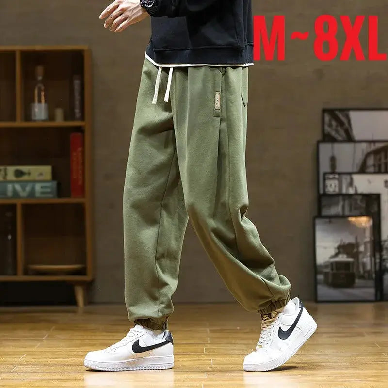 Men's olive green jogger sweatpants by Simples Market with drawstring, loose fit, size M-8XL