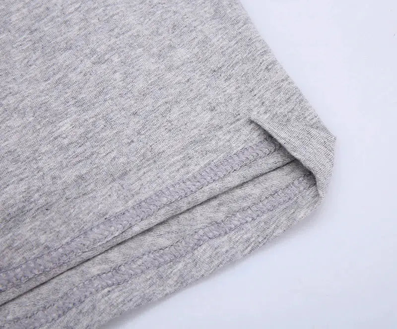 Gray cotton men's boxer shorts fabric close-up with a stitched hem, Simples Market