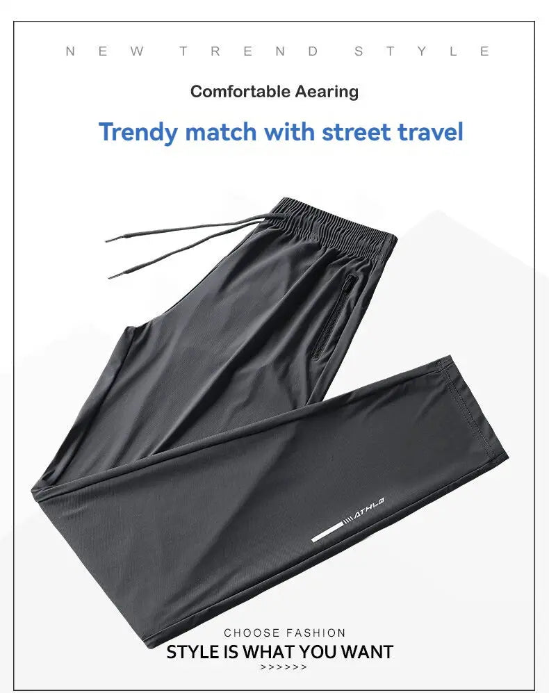 Men's ice silk pants in dark gray with elastic drawstring waist and zip pocket; quick-dry outdoor running pants.