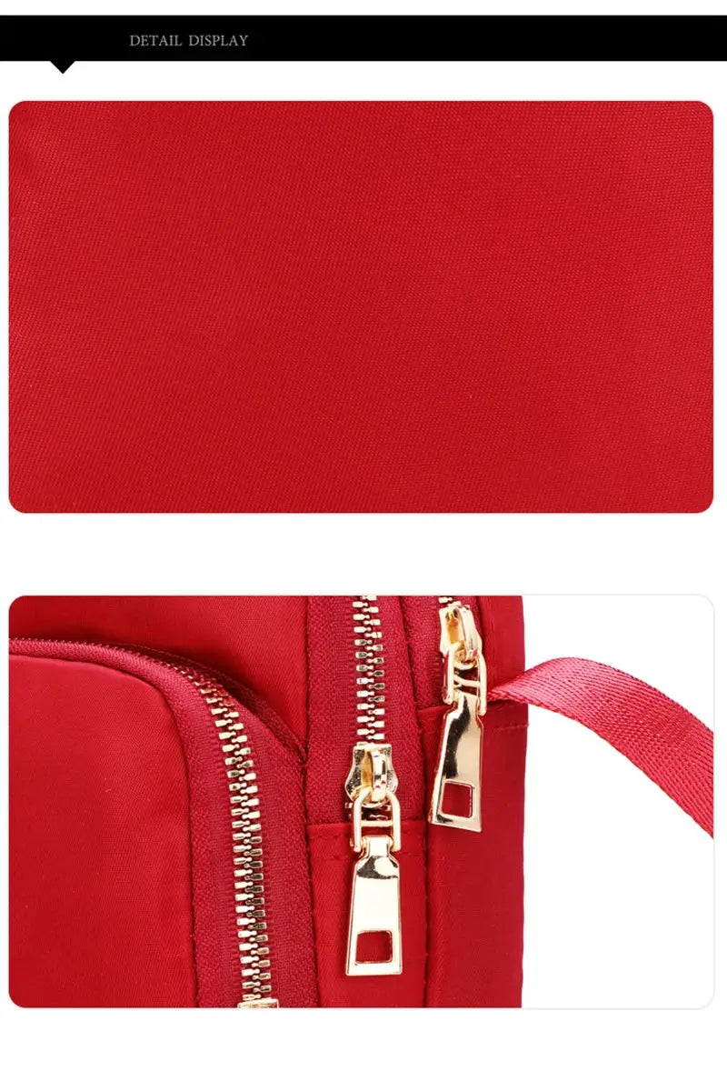 Simples Market red waterproof women's crossbody bag with gold-tone zippers and strap