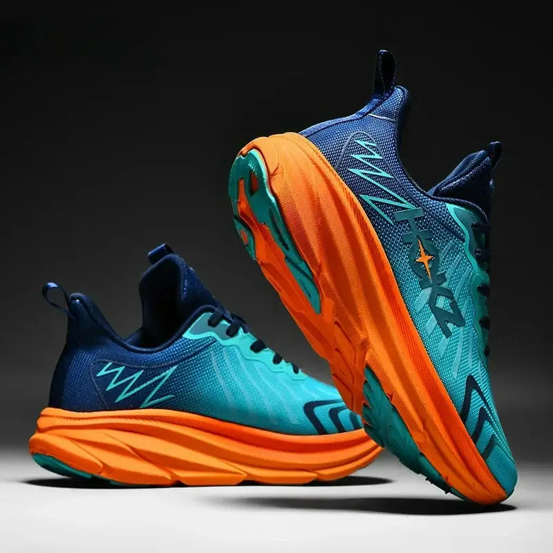 Pair of men's running shoes with breathable teal mesh upper and bright orange sole