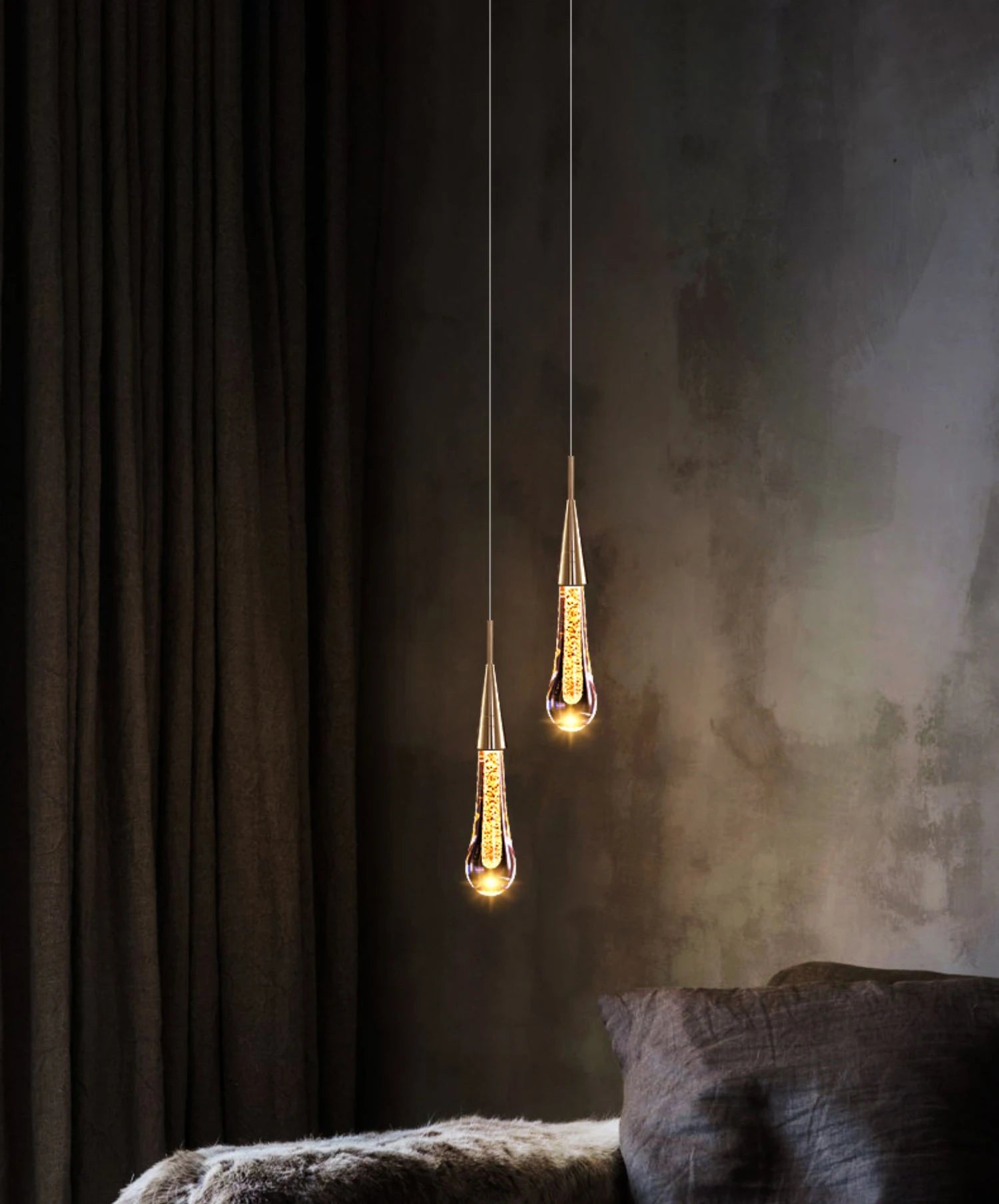Crystal LED pendant lights by Simples Market, two gold-tone copper fixtures with crystal beads.