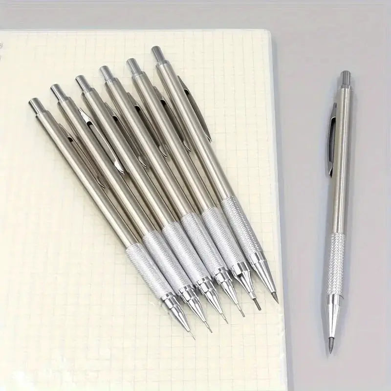 All-metal mechanical pencils set of nine in silver with knurled grips and retractable tips