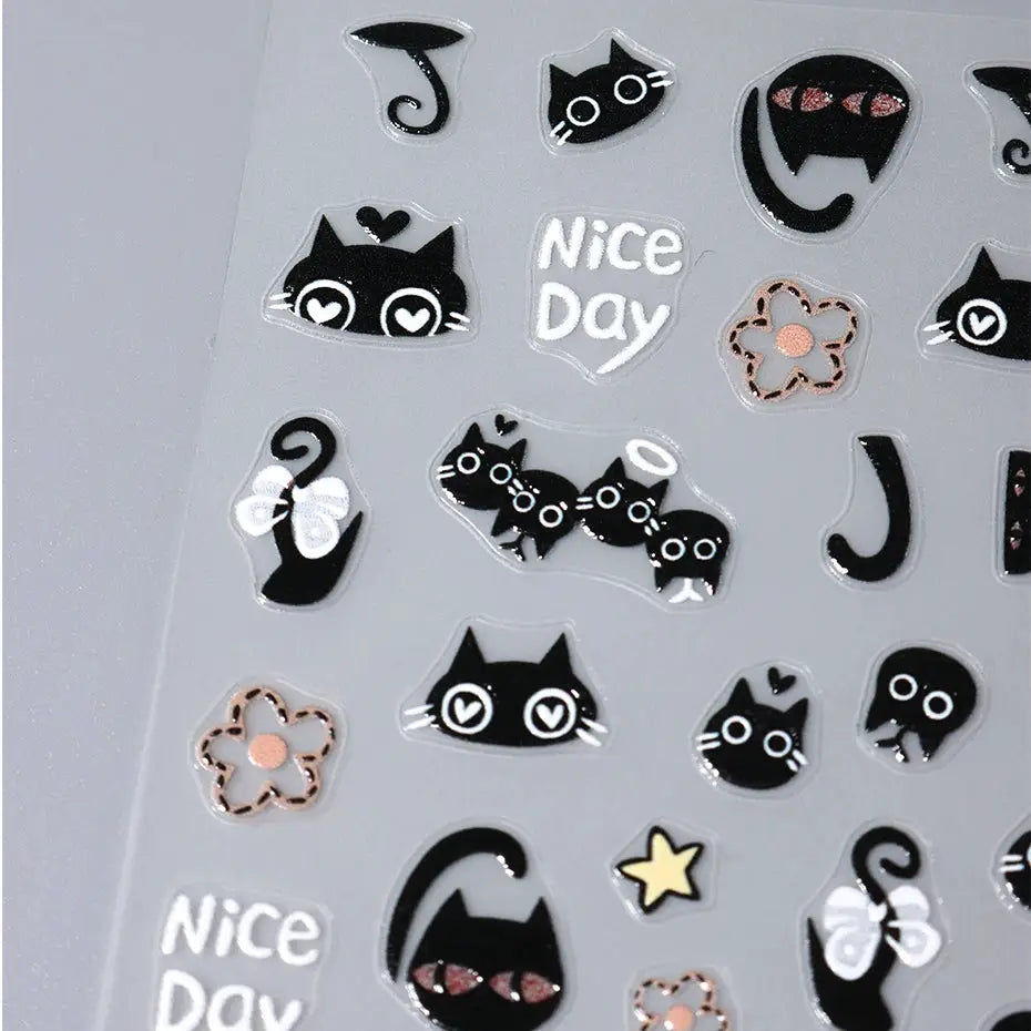 Black cat nail stickers sheet by Simples Market; 3D self-adhesive cartoon decals for manicure.
