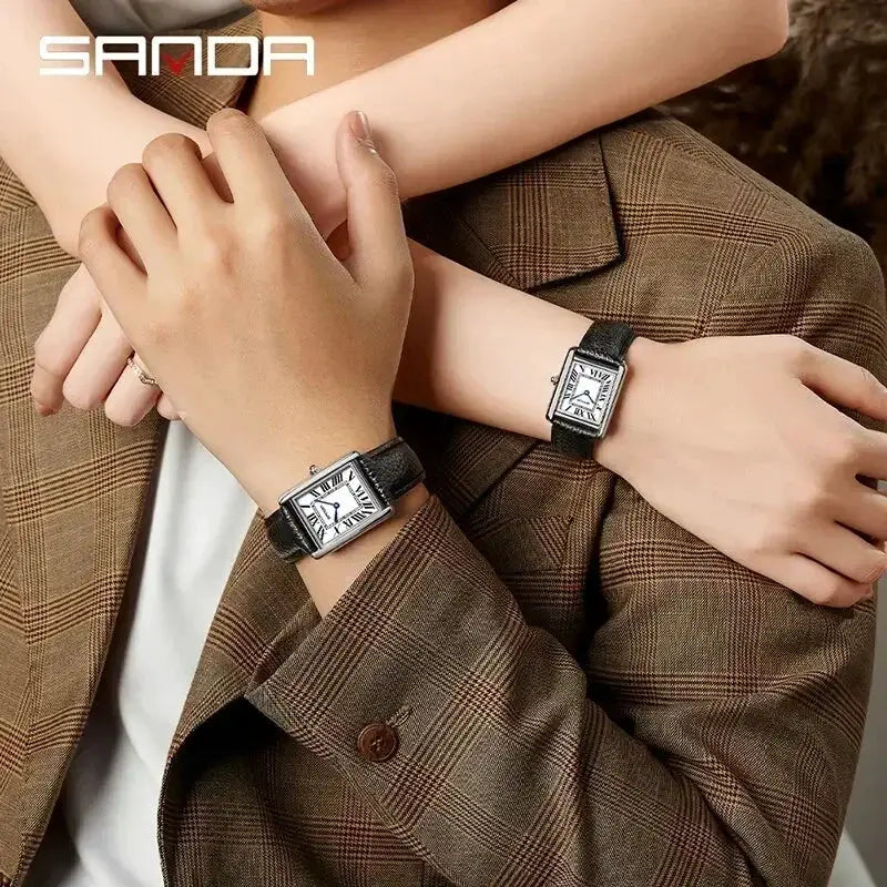 SANDA 9031/1108 luxury couple quartz watches for men and women with black leather straps and rectangular silver cases.