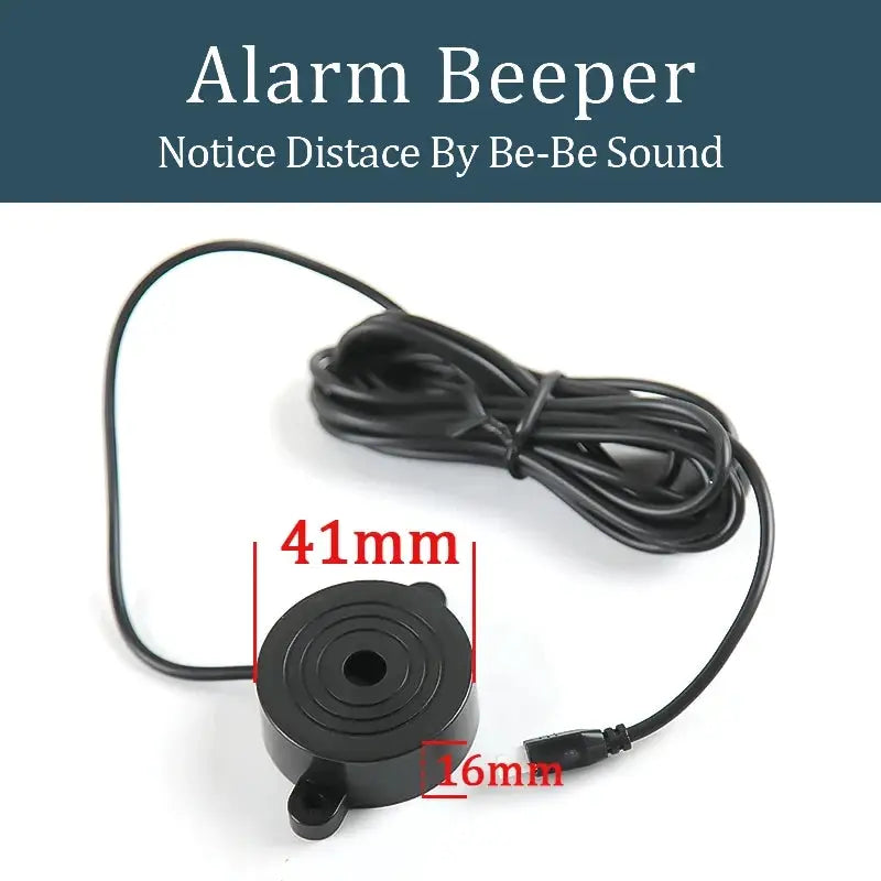 Black circular car parking sensor buzzer module with attached cable, 41mm diameter, 16mm thick
