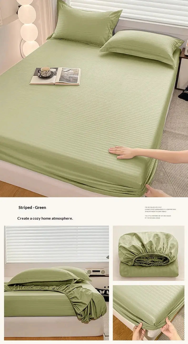 Green fitted bed sheet with elastic edge for single to king beds; striped texture.