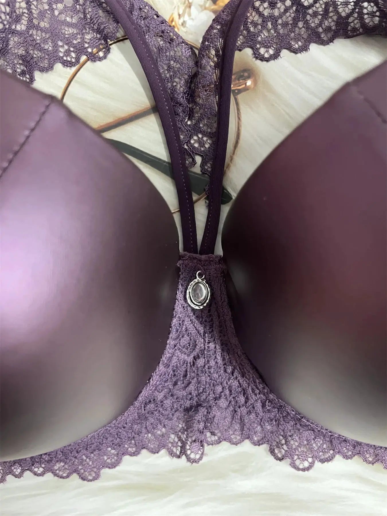Purple lace underwire bra with molded cups and delicate trim