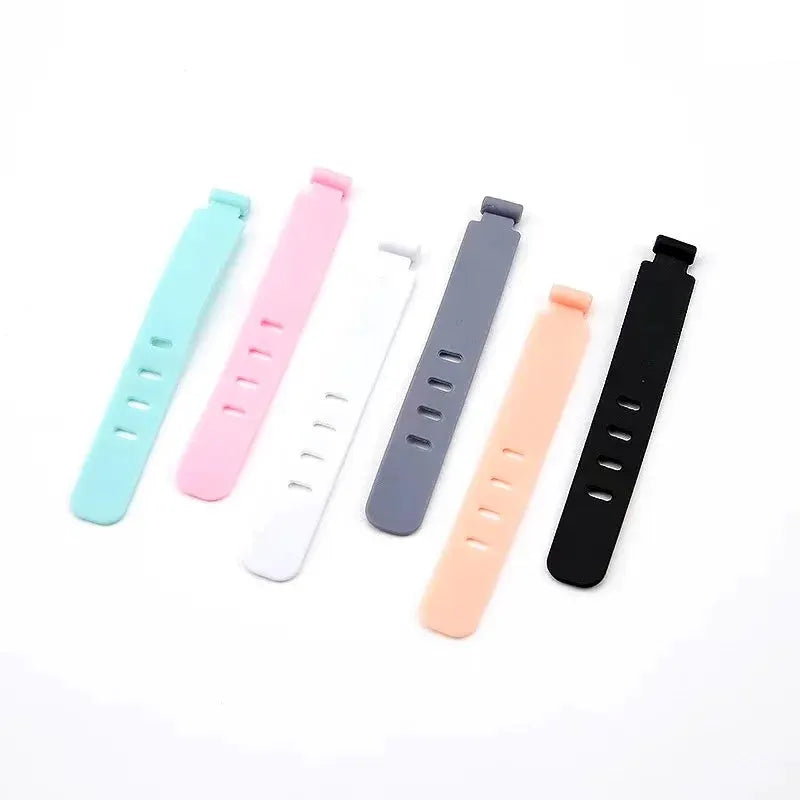 Silicone cable organizer ties, six-piece pastel set for chargers and data cables in mint pink white gray peach and black