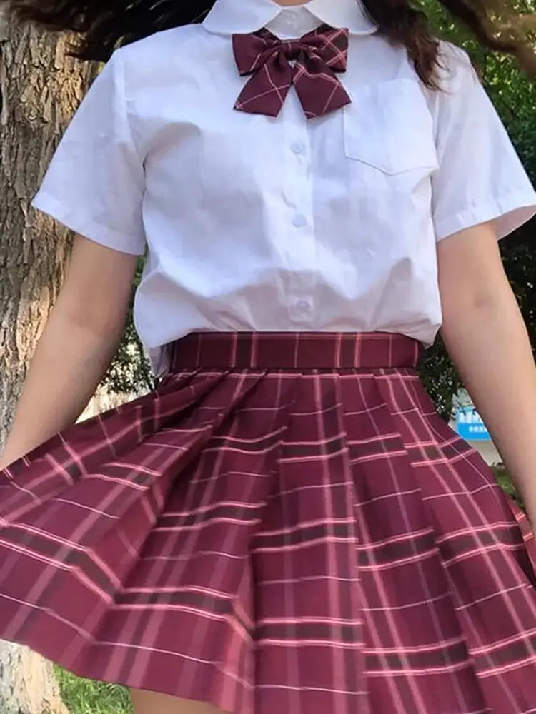 Two-piece plaid pleated high-waist skirt set with white shirt and burgundy bow