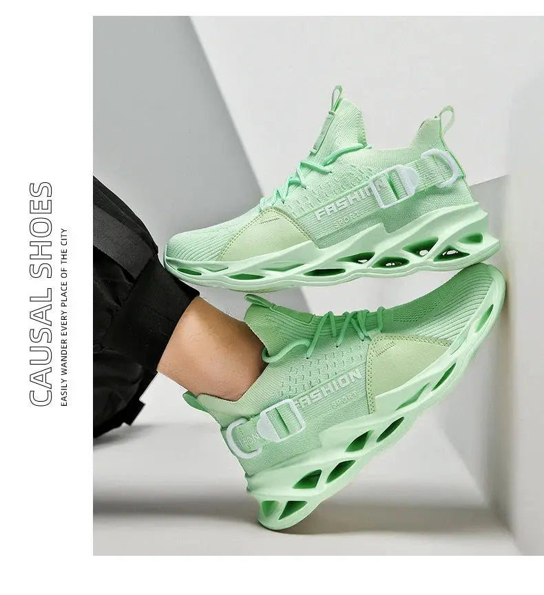 Pair of mint green mesh sneakers; breathable, thick-soled unisex casual athletic shoes.