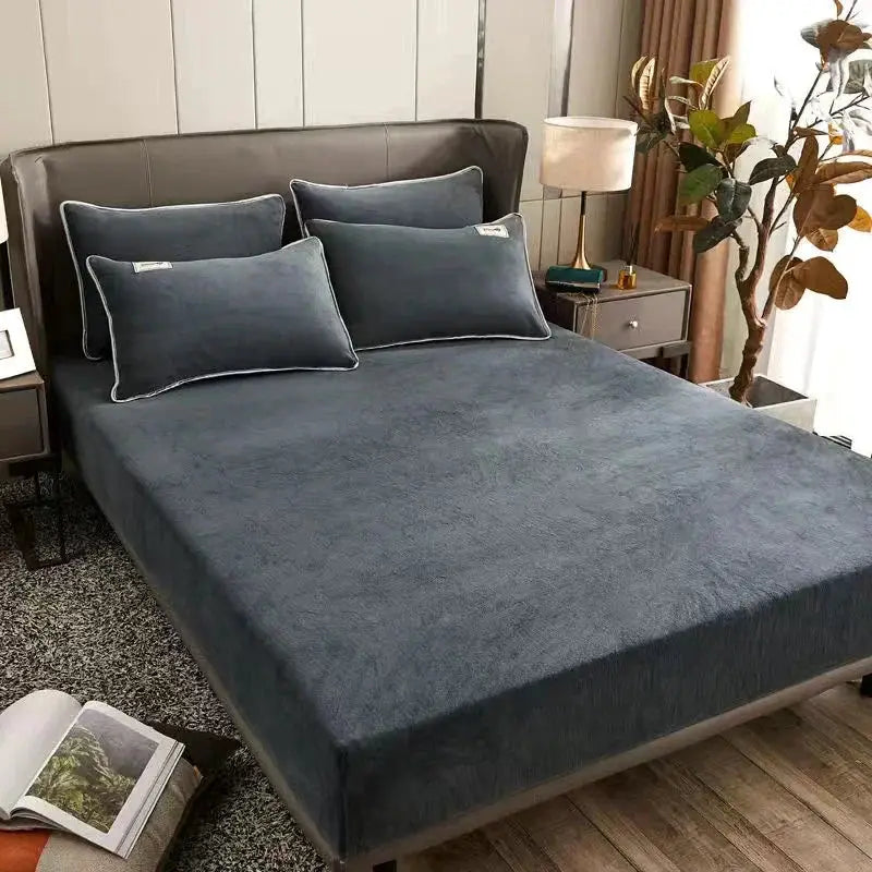 AISIRUI warm winter plush fitted sheet on a double bed with dark gray plush pillows in a modern bedroom.