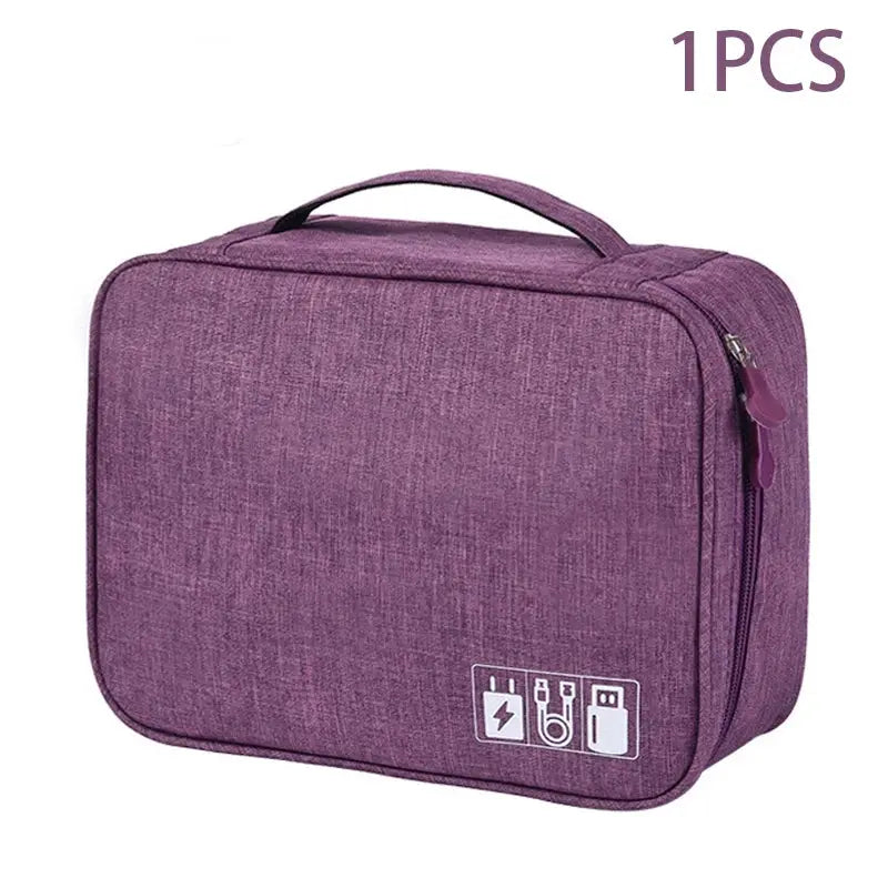 Travel cable storage bag by Simples Market, purple fabric with zipper and carry handle