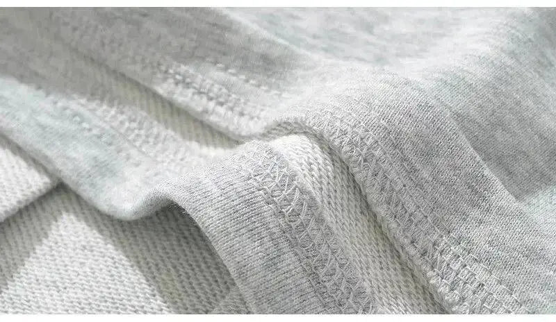 Mooyufon fabric close-up in light grey knit texture, suitable for apparel