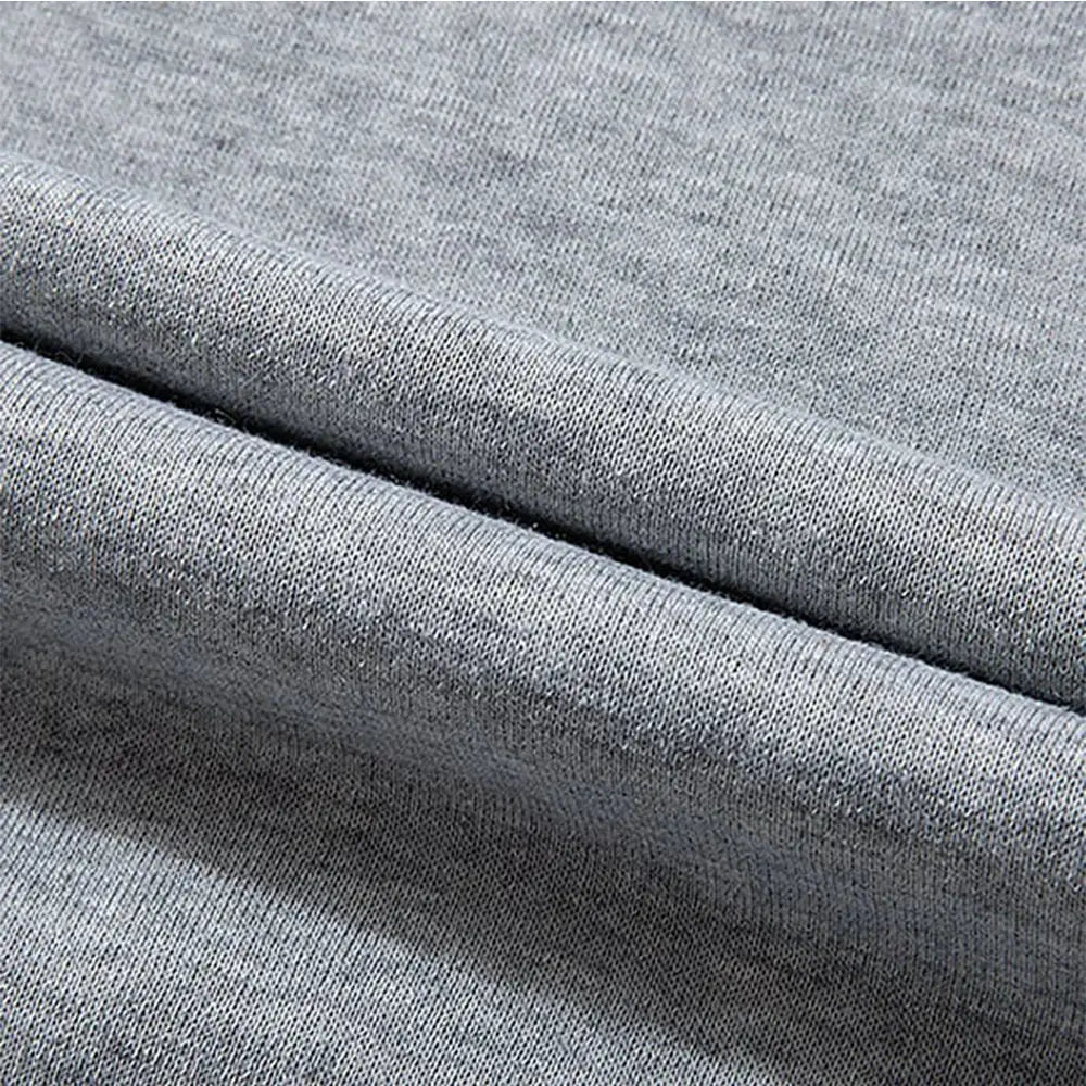 Toji compression shirt set grey heather fabric close-up.