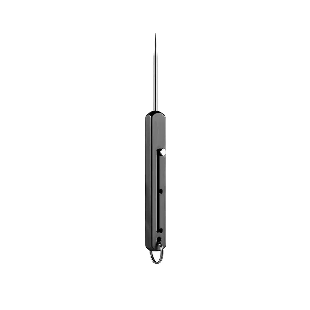 Simples Market portable titanium toothpick holder in black with a long toothpick protruding and a metal keyring.