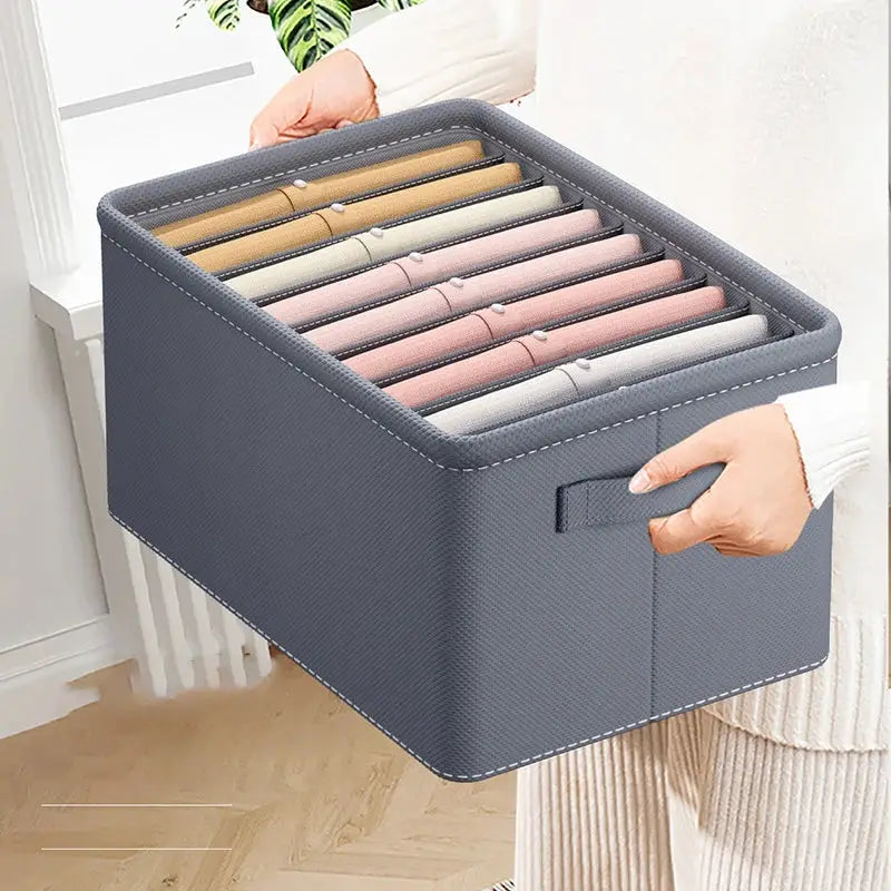 Foldable gray fabric pants storage box with 9-grid compartments for wardrobe organization.