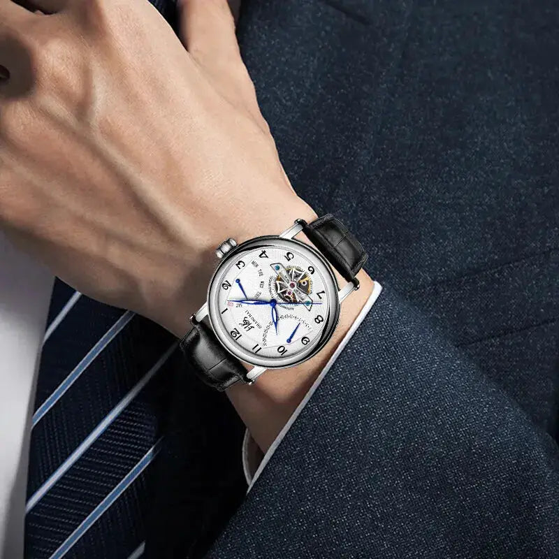 Shanghai Watch 42mm automatic wristwatch with stainless steel case, black leather strap and blue hands