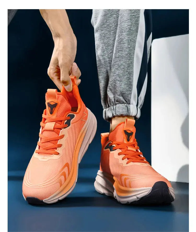Running shoes by Simples Market in coral orange with breathable mesh and cushioned, lightweight design.