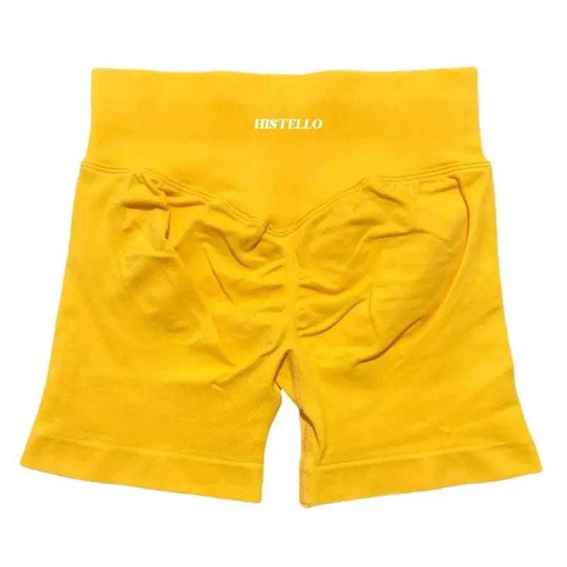 Histello sports shorts, yellow low‑waist seamless with scrunch stretch and breathable fabric