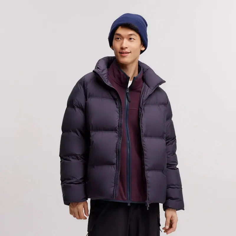 Simples Market down jacket; navy puffer coat, short length, zip front, unisex.