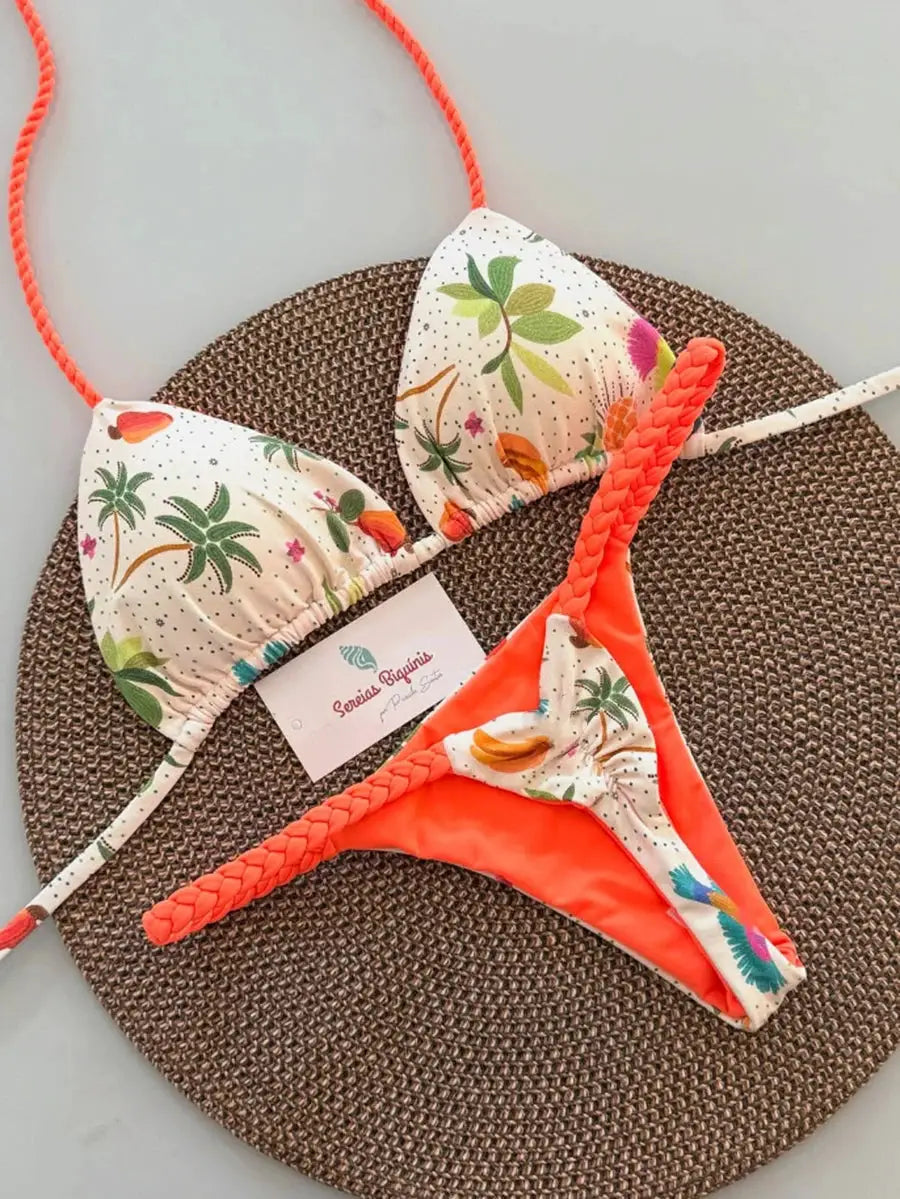 Micro bikini set with tropical-print triangle top and orange braided thong bottom, two-piece