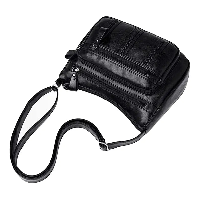 Women's crossbody bag by Simples Market, black PU leather, multilayered design with adjustable shoulder strap