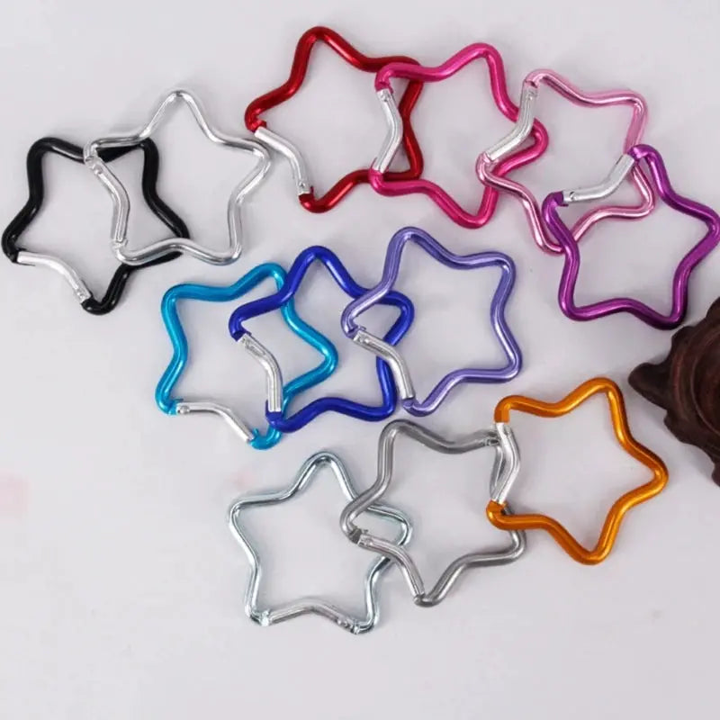 Aluminum alloy star-shaped carabiner clips set in assorted colors by Simples Market