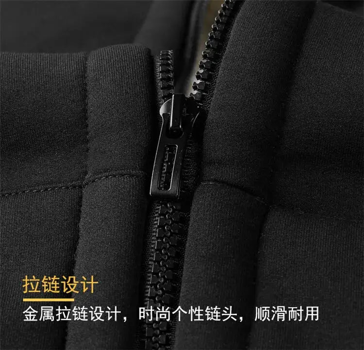 Black hooded winter jacket with metal zipper and padded quilted design; unisex.