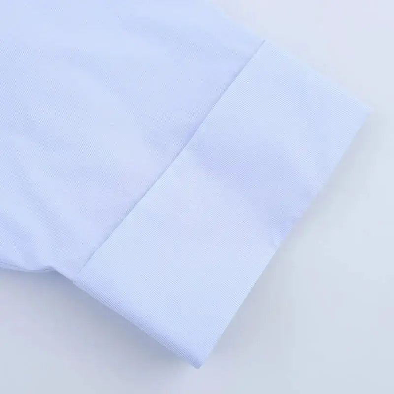 HXAO 2025 women's long-sleeve shirt, light blue cuff detail, Simples Market