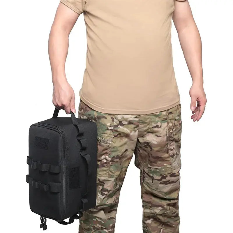 Large-capacity outdoor camping storage bag in black with top carry handle and external strap loops