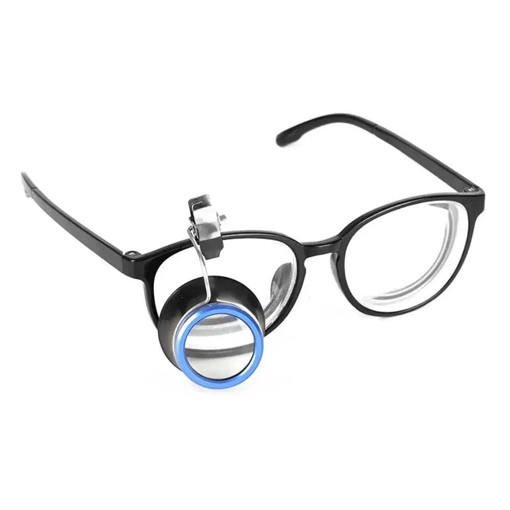 Clip-on magnifier for glasses by Simples Market; blue-ring lens offers 5x/10x/20x for watchmaker jewelry repair.