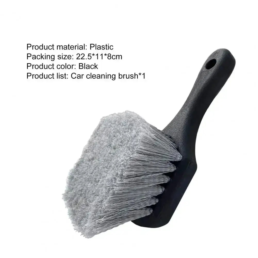 Car wheel cleaning brush with short black handle and gray bristles for tires and rims