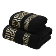 2-piece black cotton towel set with gold embroidered Greek key border