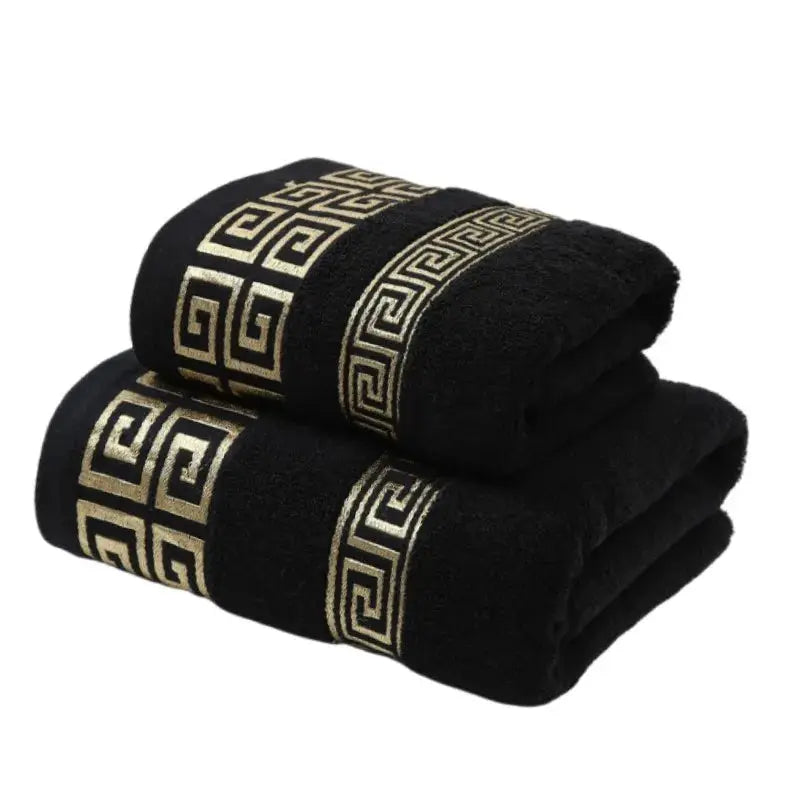 2-piece black cotton towel set with gold embroidered Greek key border