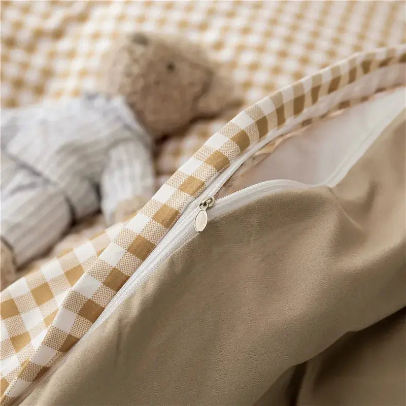Kawaii bear duvet cover set in beige with beige-and-white gingham border and white zipper.