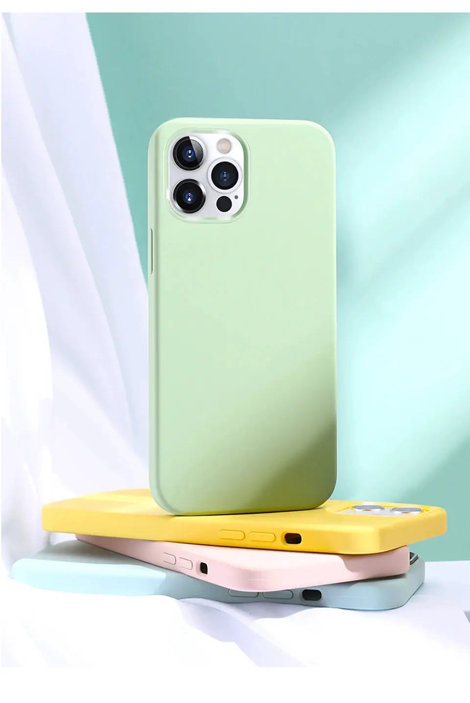 Simples Market luxury liquid silicone iPhone case, pastel green, shown with four stacked cases in yellow, pink and blue