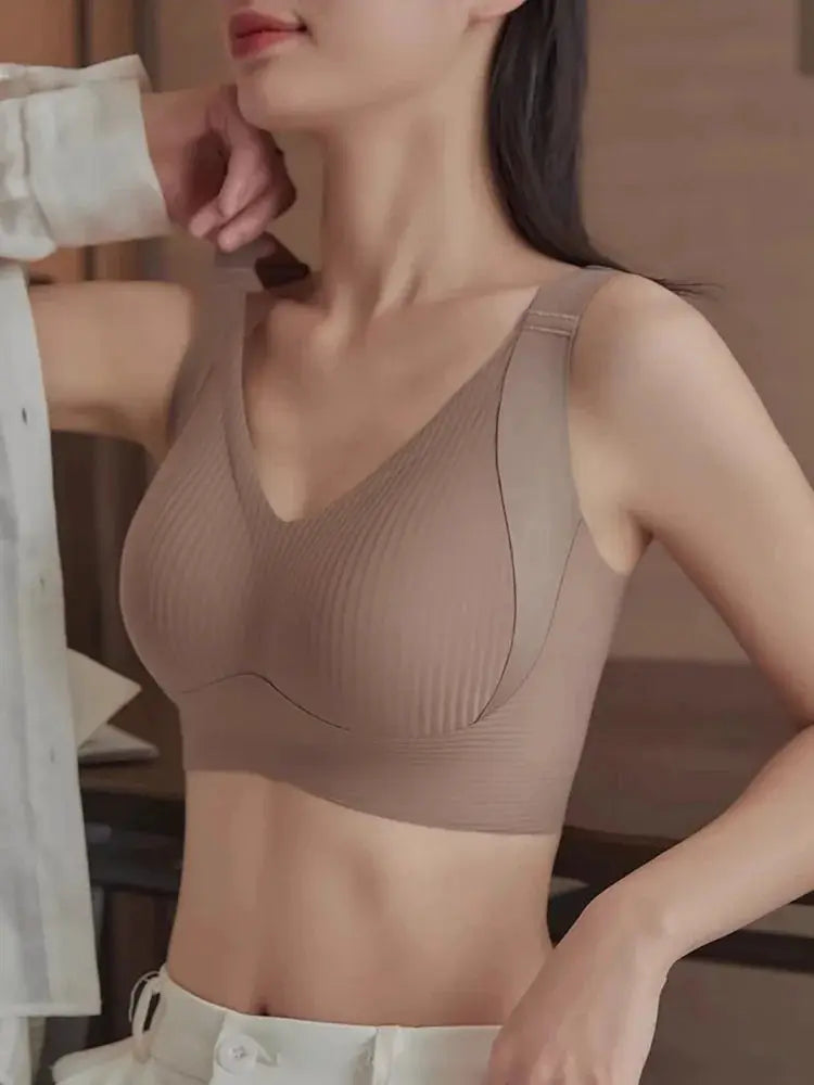 Beige seamless wireless bra with ribbed cups and pull-up design