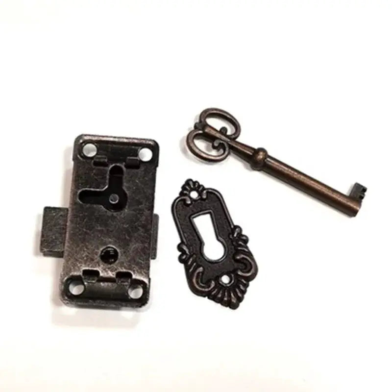 Antique bronze door lock set with key and ornate escutcheon plate (3-piece)